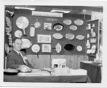 David Dalquist displays his company’s products at a Housewares Show in the late 1940s.